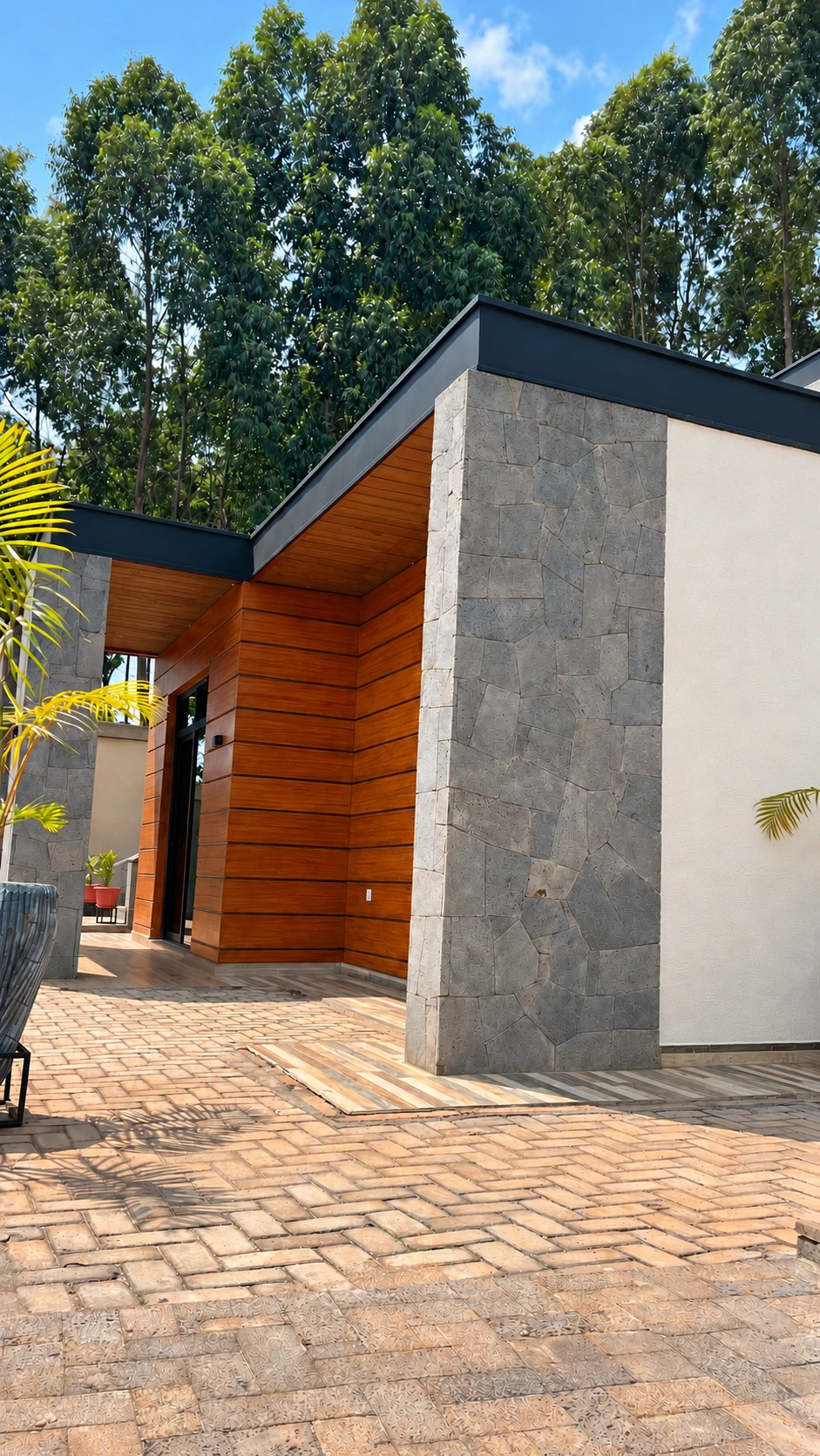 Connection Hotel — Stone cladding and timber-tone façade