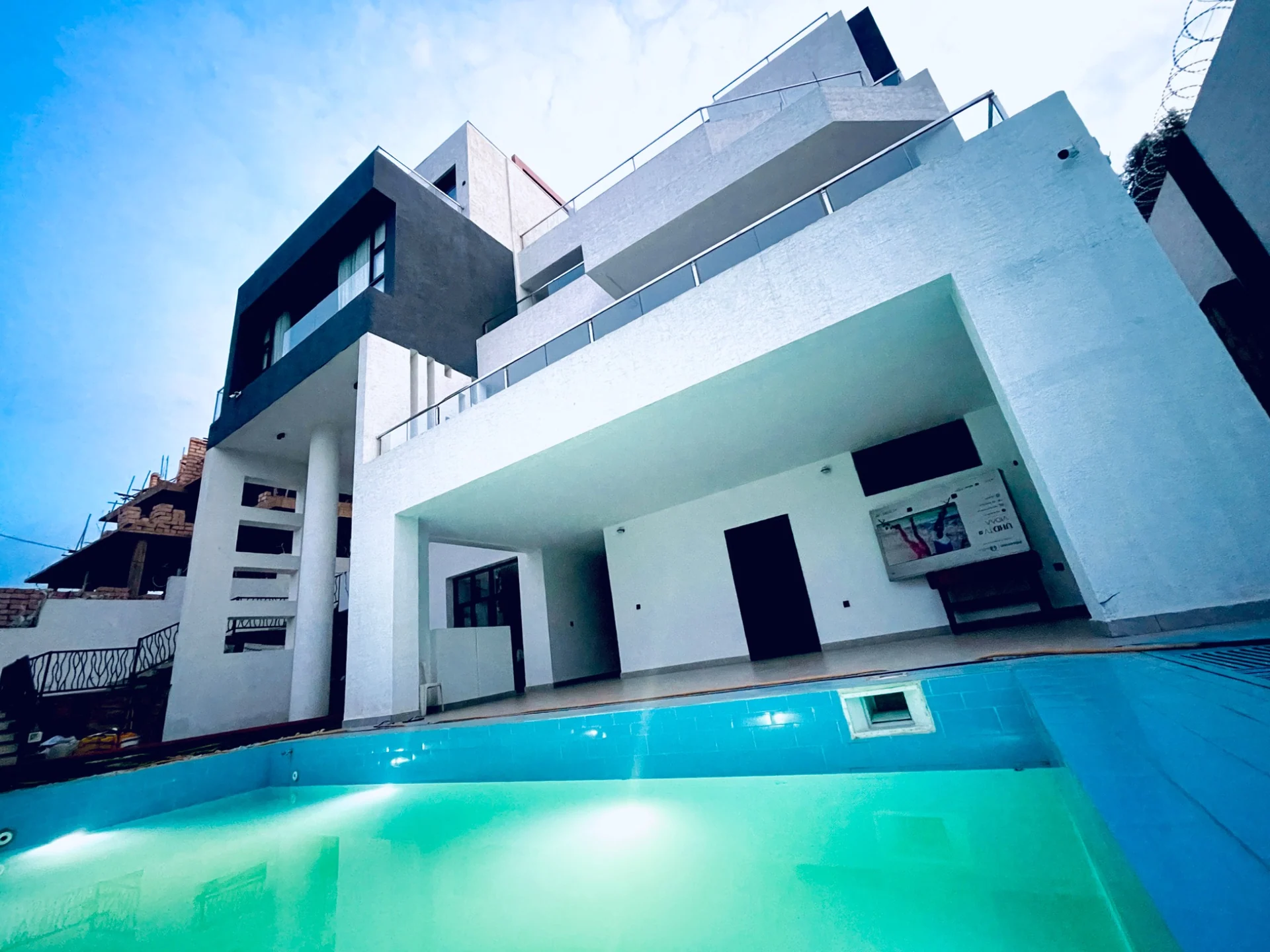 Pool-side façade — original project photograph